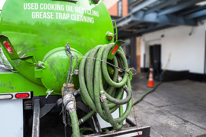 an industrial grease trap being pumped out in Bedford Park, IL